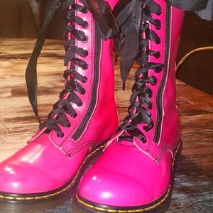 Doc martens size ten women's pink boots with black laces, missing sole.